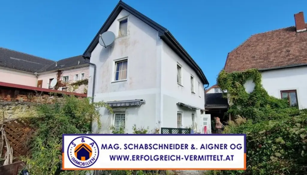Kleines Stadthaus zum Renovieren mit ruhigem Garten mitten im Zentrum!