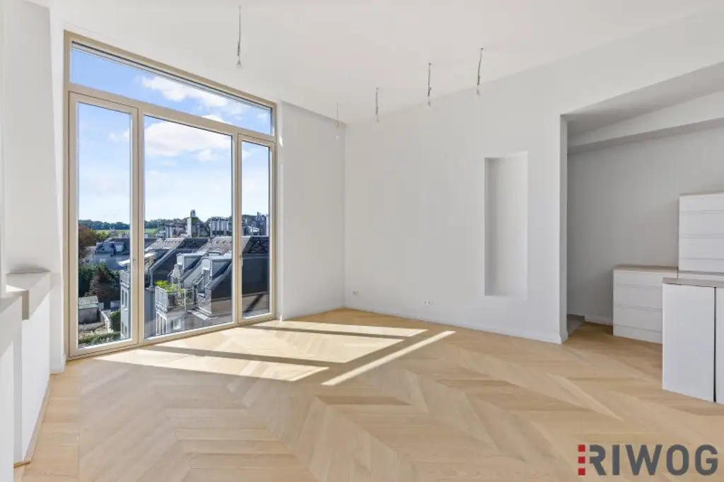 3,7m Raumhöhe im DG, Garage mit 2 Stellplätze, Atrium, Aufzug in die Wohnung und 360° Dachterrasse
