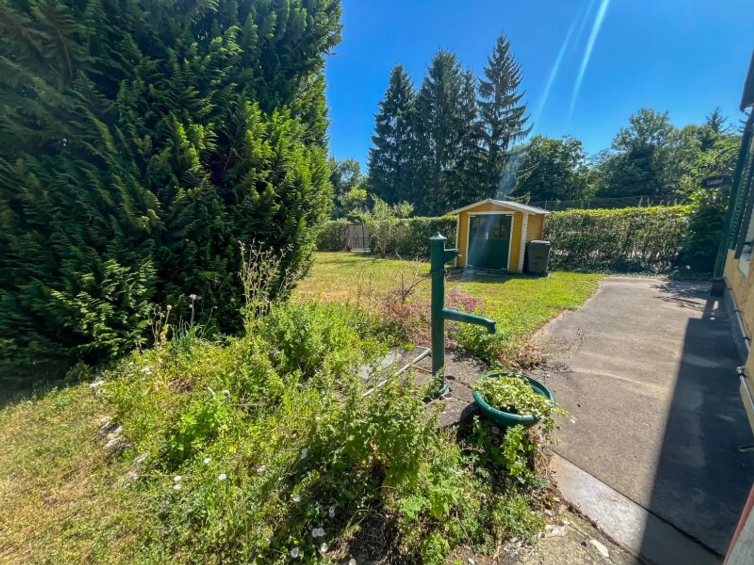 Rarität im Wienerwald! Romantisches Jahrhundertwendehäuschen mit großem Garten
