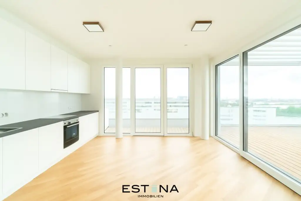 Lichtdurchflutete Dachgeschosswohnung mit beeindruckendem Panoramablick auf die Donauinsel