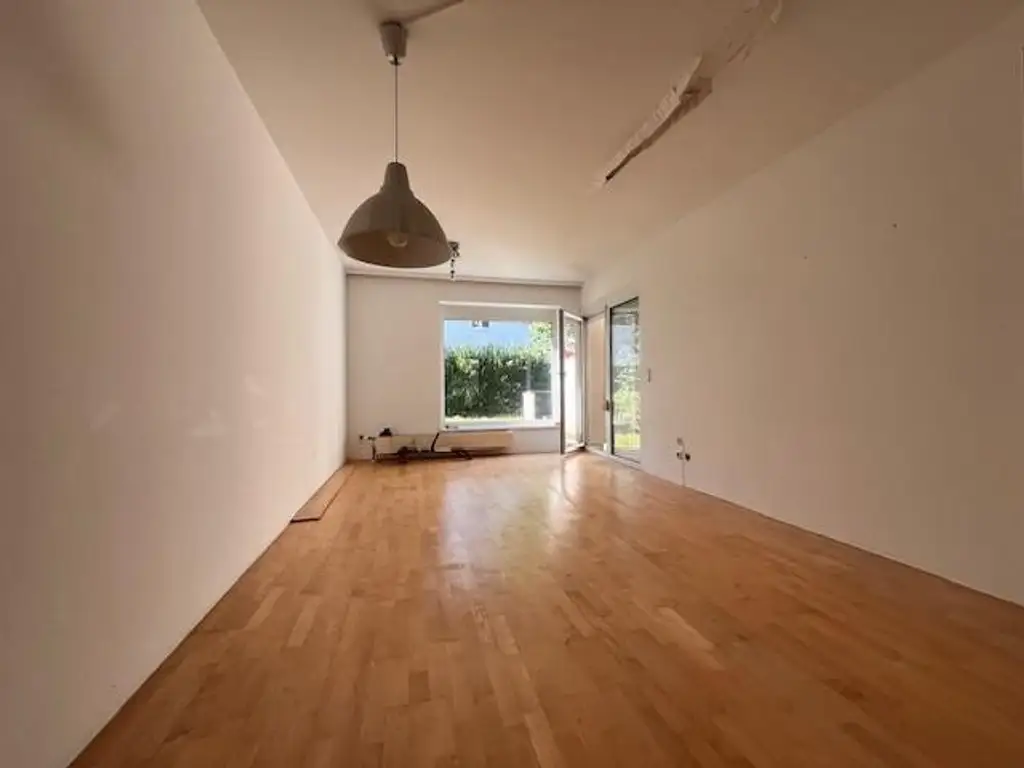 Tolle 2-Zimmer-Wohnung mit Eigengarten, Loggia und TG-Platz zu verkaufen