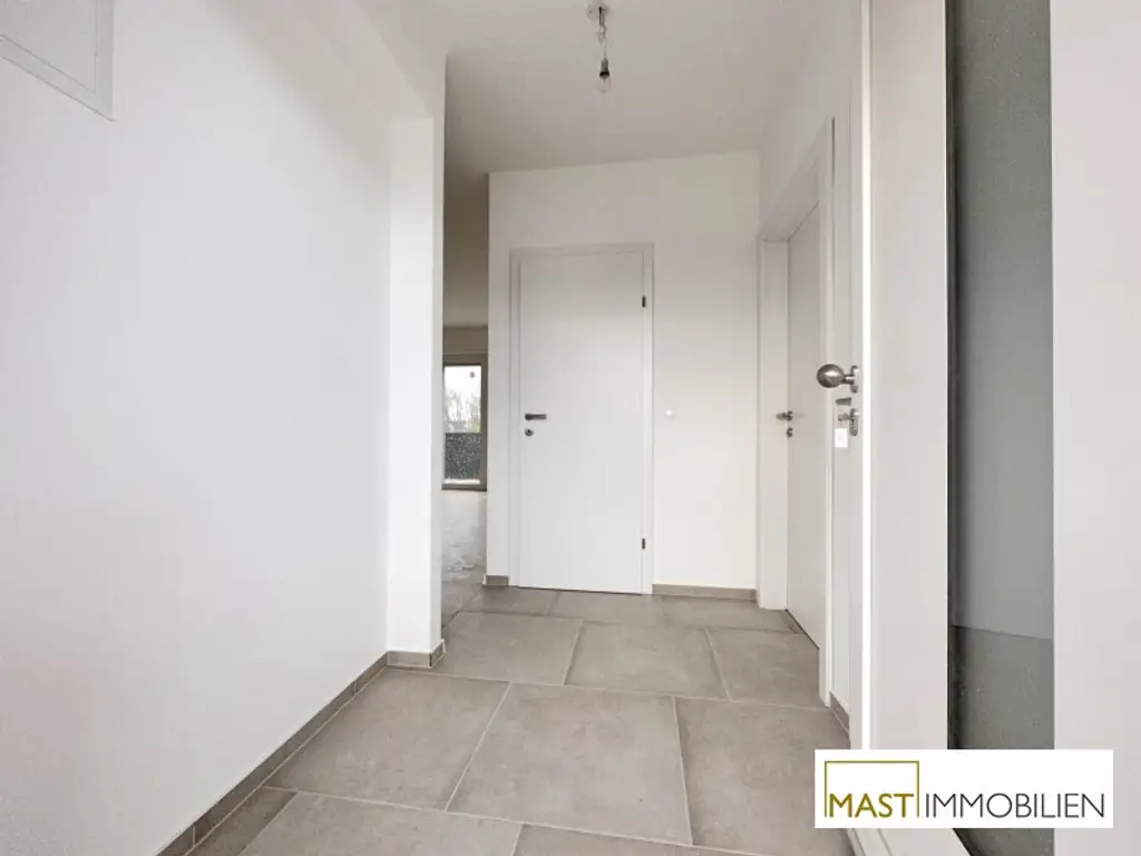 Ab sofort! Lichtdurchflutete 2-Zimmer-Neubauwohnung mit 8m² Terrasse