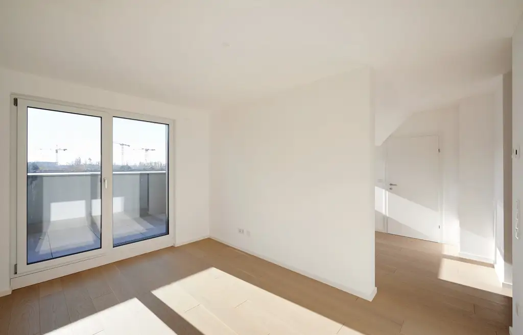 4-Zimmer-Dachgeschosswohnung mit Terrasse in idyllischer Grünlage 
nahe Donau - ERSTBEZUG!