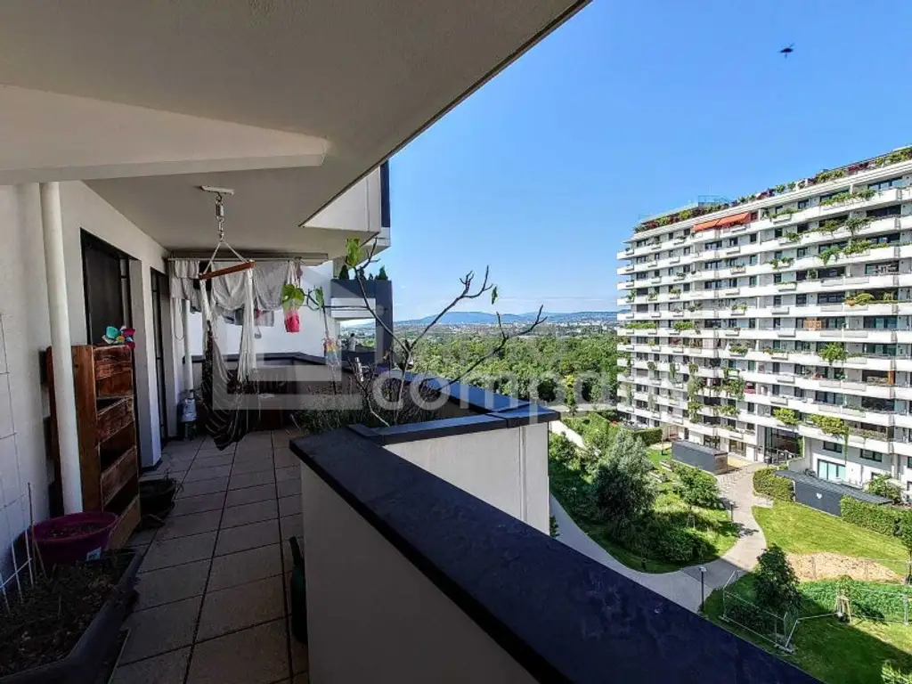Neubau-3-Zimmer mit 14 m²-Balkon, Tiefgarage & Blick auf den Wienerberg