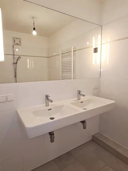 EIGENGARTEN, LORYSTRASSE, 75 m2 Neubau mit 23 m2 Garten, 2 Zimmer, Wohnküche, Wannenbad, Parketten, 1. Liftstock