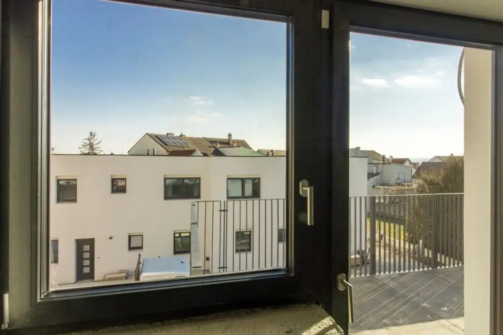 Sonnenstrahlen am Balkon - Erstbezug in Kleinhöflein
