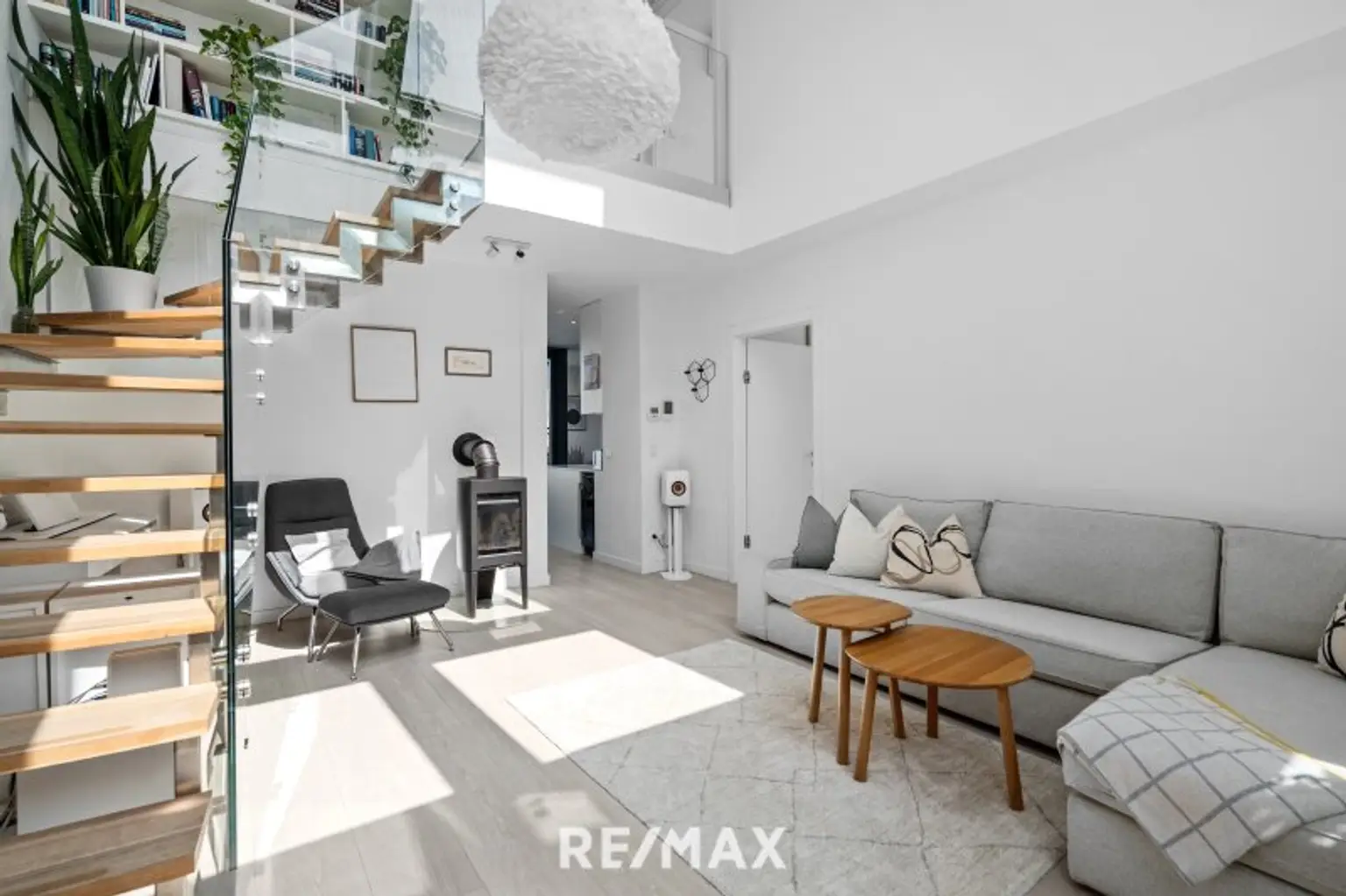 Wohnzimmer mit der Treppe und Galerie