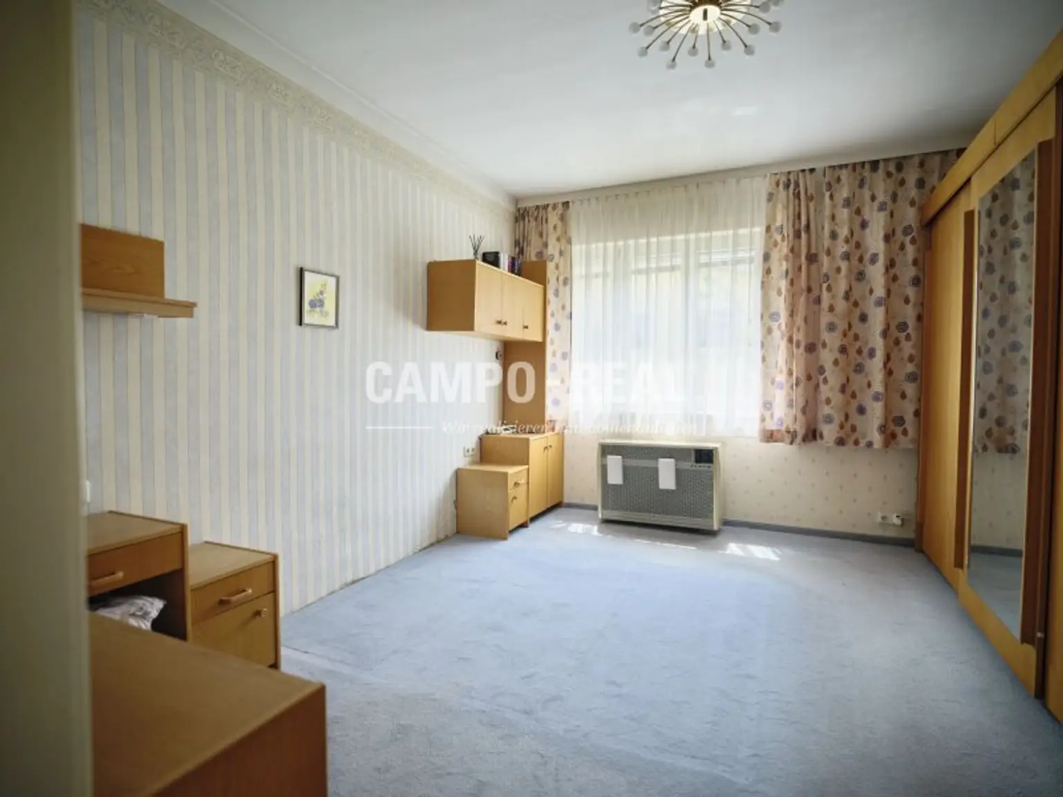 CAMPO REAL: Charmantes Stadthaus – Ihr Renovierungsprojekt mit Potential!