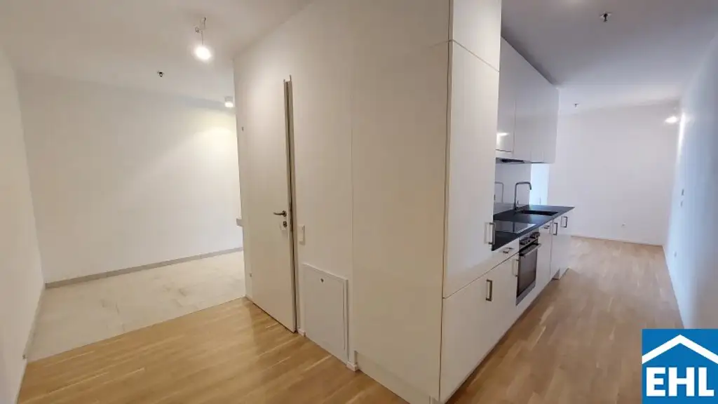 Sonnwendviertel: 1-Zimmer-Wohnung mit Balkon im 9. OG – Fitnessraum, Co-Working & Rooftop-Terrasse inklusive!