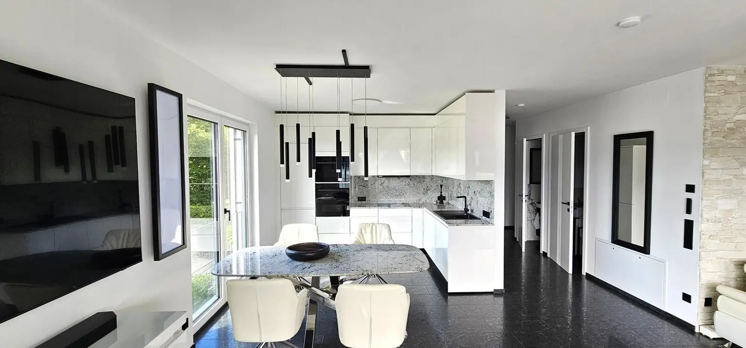 Design trifft Lebensqualität – Exklusive Neubauwohnung mit Seeblick