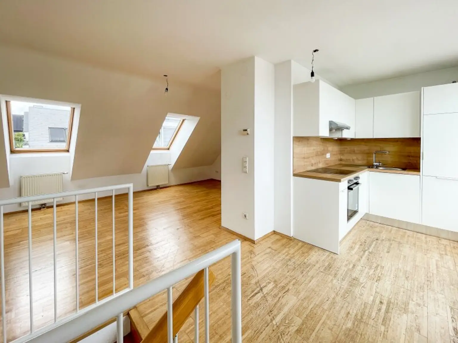 DG-Maisonette mit Terrasse – Wohnen auf zwei Ebenen in ruhiger Stadtlage mit Weitblick