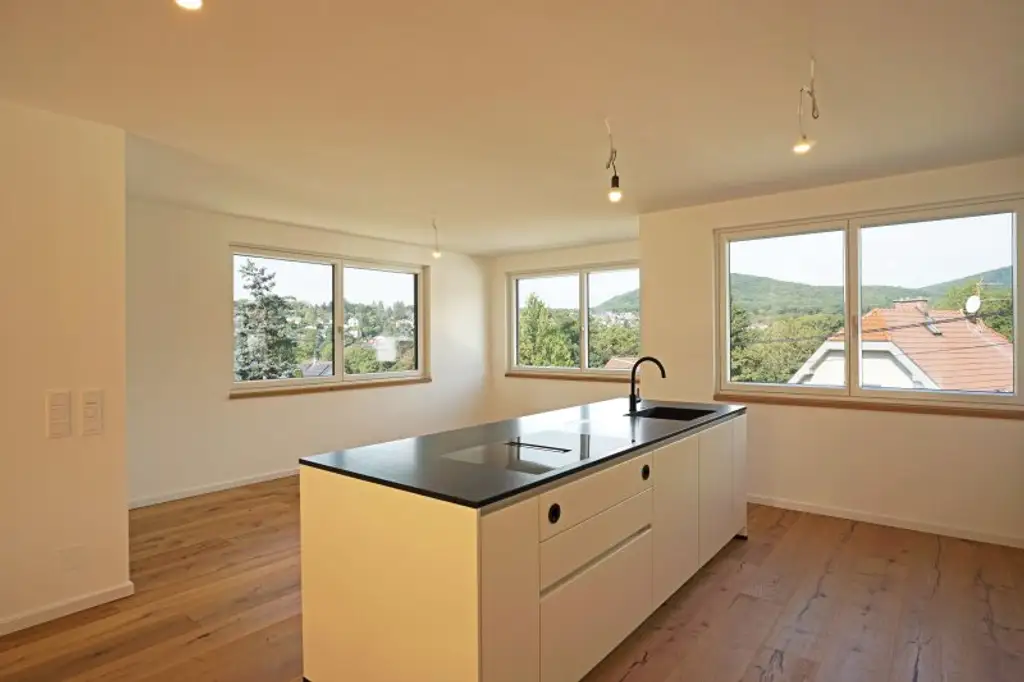 Satzberg: Exklusive Maisonettewohnung mit Stellplatz, kleinem Garten und Traum-Terrasse - ERSTBEZUG