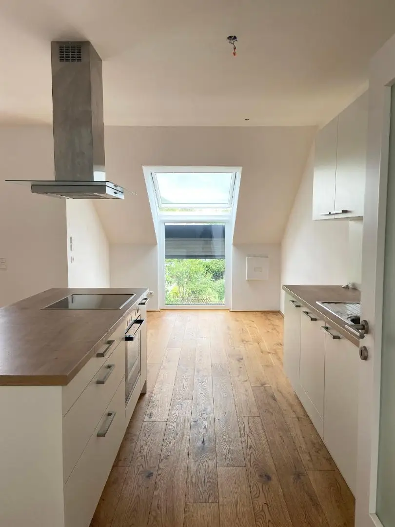 Moderne Dachgeschosswohnung inkl. Einbauküche und Loggia - Top A08