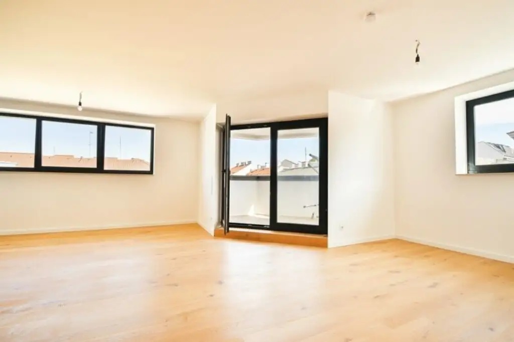 Charmantes Dachgeschoss-Domizil mit Loggia in urbaner Toplage