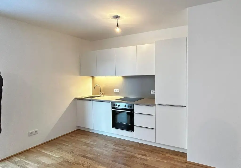 Moderne 4-Zimmer DG-Wohnung mit Kühlung und Süd-Terrasse!