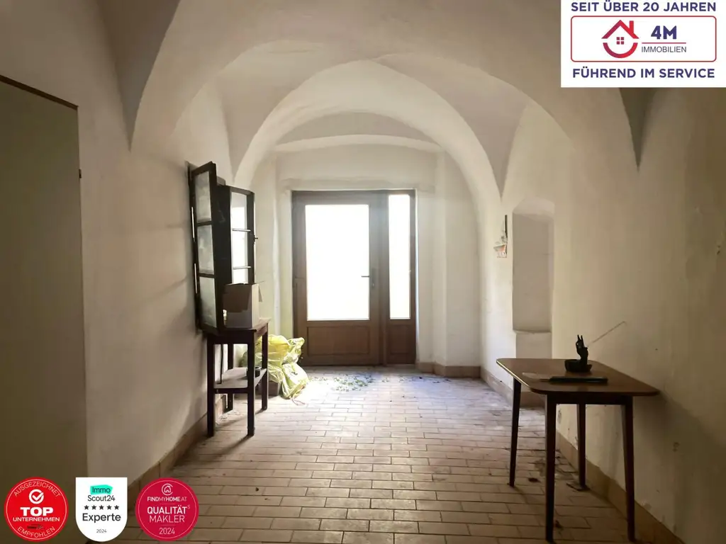 Mehrfamilienhaus mit Geschäftslokal und beh. genehmigter Aufstockung