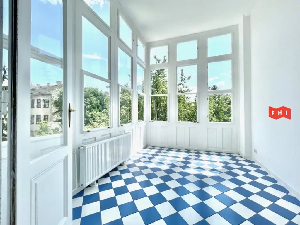 Unbefristete 140m² Stilaltbaumiete mit verglaster Wintergartenveranda, Gartenblick u. historischen Kachelöfen