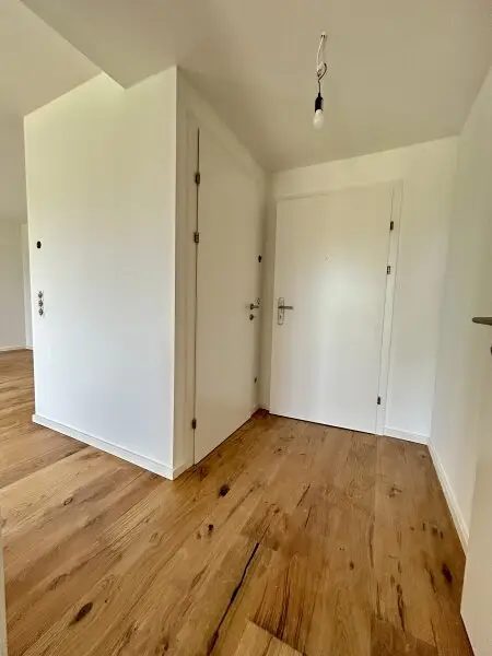 Erstbezug in Mannswörth: Moderne 2-Zimmer Wohnung mit Balkon