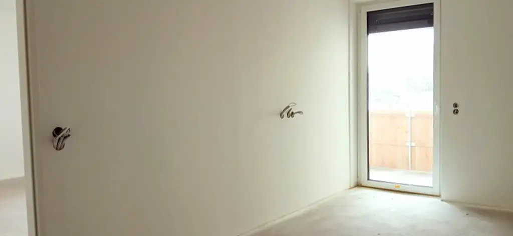 NEUBAU - ERSTBEZUG - Top 10 - Wunderschöne 2 Zimmerwohnung mit großem Balkon und eigenem Tiefgaragenplatz