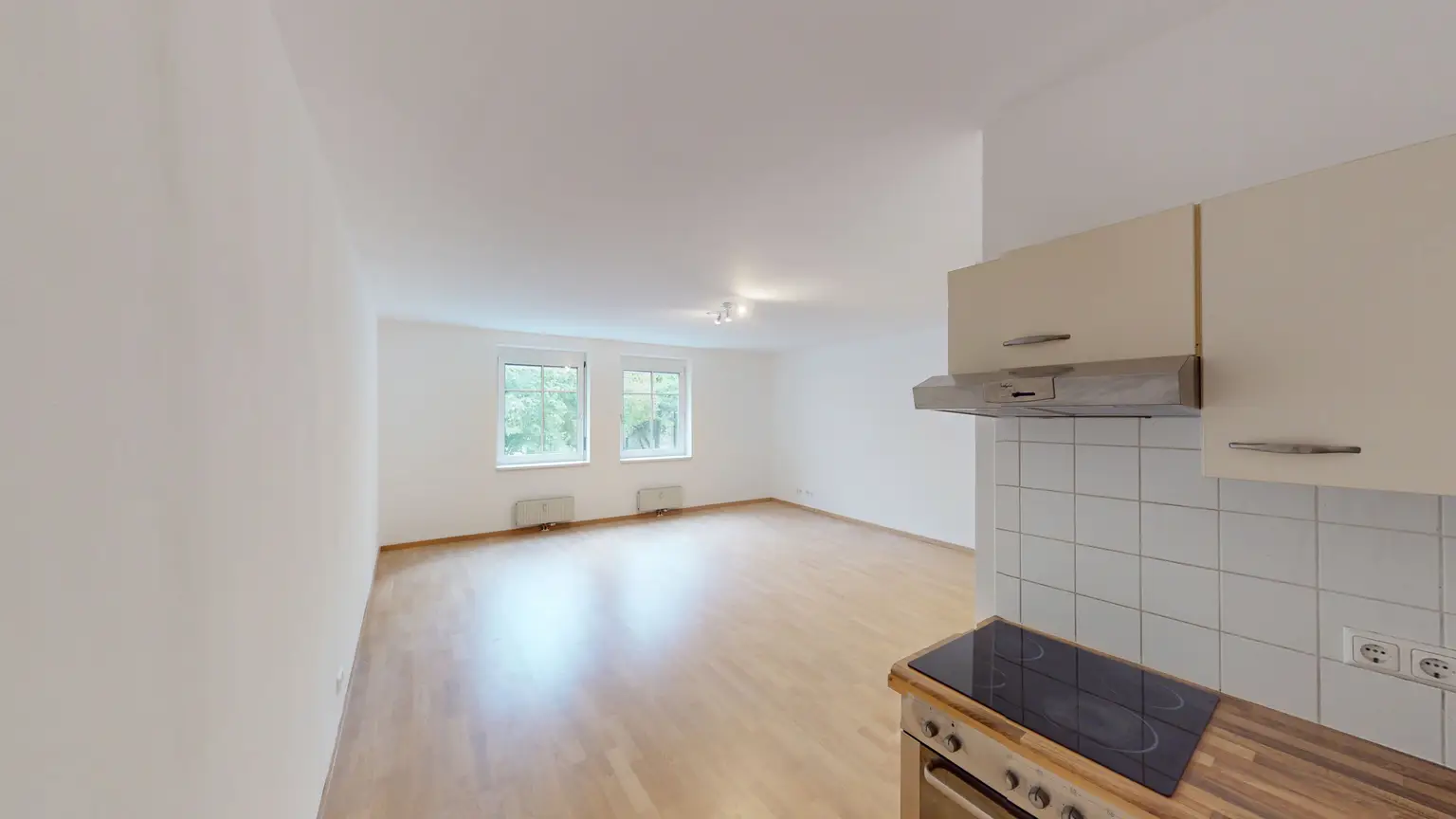 Helle 2,5-Zimmer-Wohnung im 2. Liftstock – ruhige Lage mit Grünblick & optionalem Garagenplatz