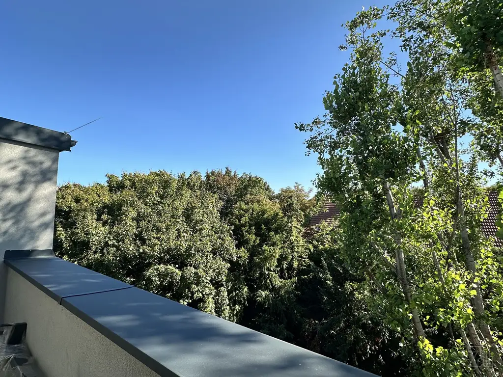 Helle Dachgeschoßwohnung mit südseitiger Terrasse & Grünblick | 2 Zimmer | ERSTBEZUG