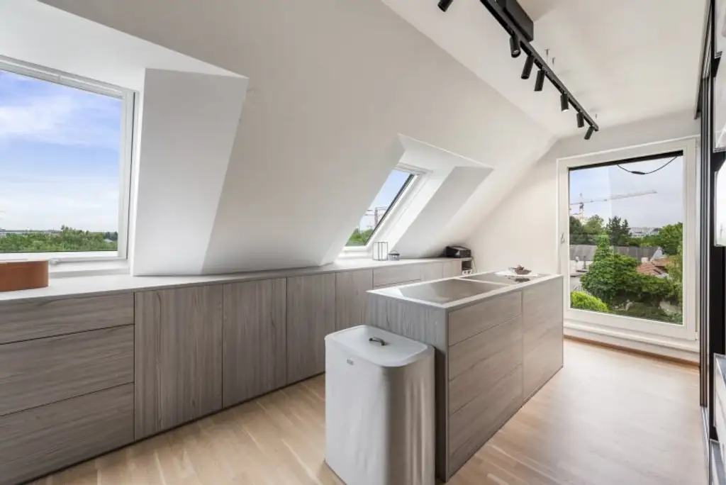 Rarität und Wohntraum! Dachgeschosswohnung mit südwestseitiger Terrasse an der oberen Alten Donau auf Eigengrund! Garagenplatz inkludiert
