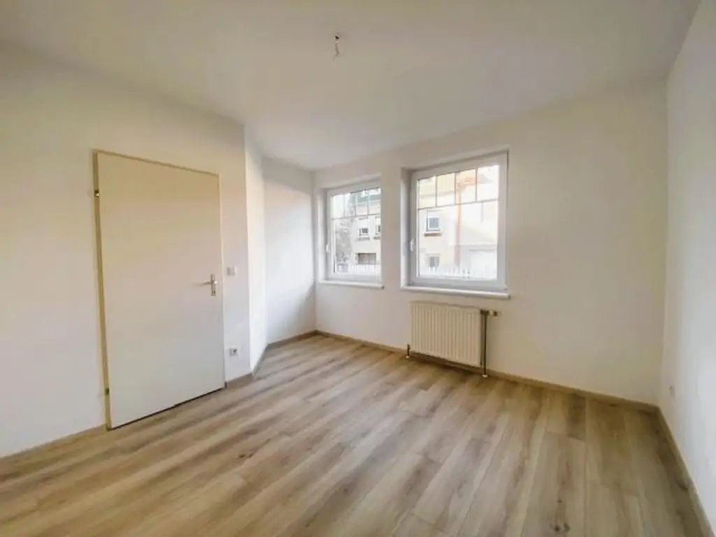 Grüne Oase in Kliniknähe – Erdgeschosswohnung wie neu, mit Carport & Garten!
