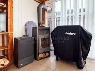 Wintergarten mit Kamin