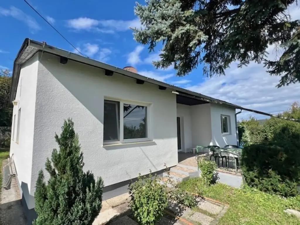 Seeblick inklusive! Bungalow mit 3 Schlafzimmern und charmantem Garten- mit Erweiterungsmöglichkeit!