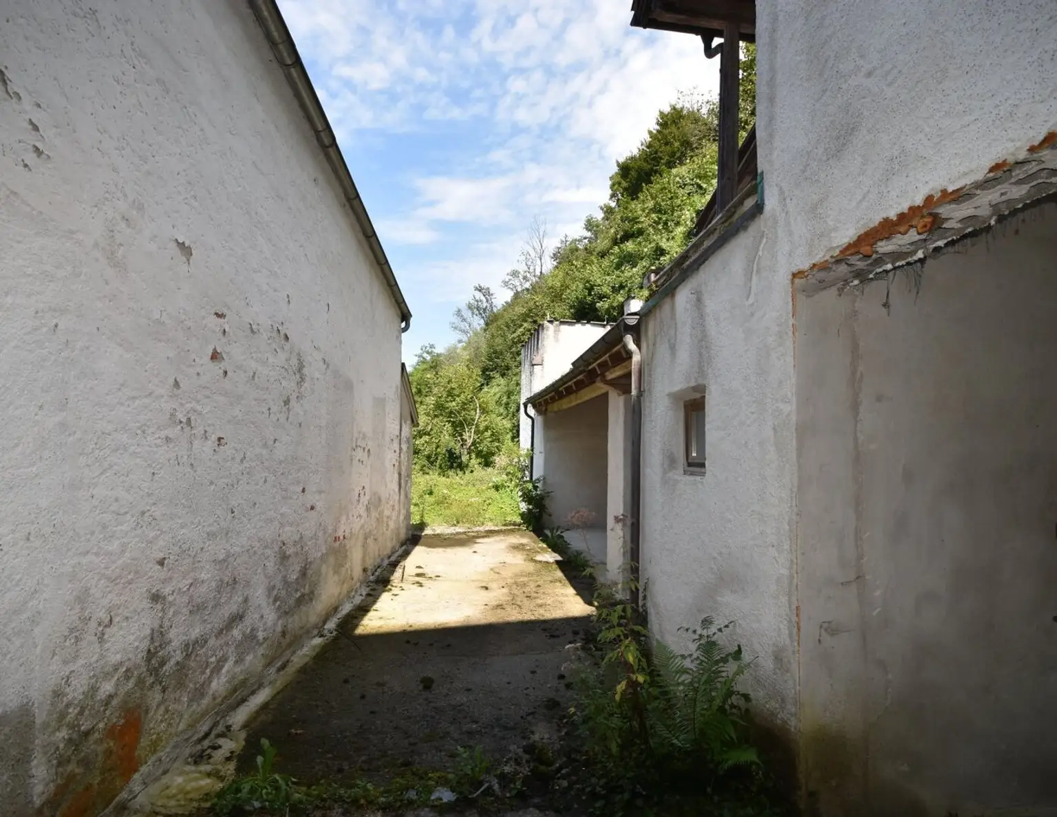 "HOCHBURG-ACH - Einzigartige Gartenmaissonettewohnung mit großer Terrasse und Blick auf die Altstadt von Burghausen"