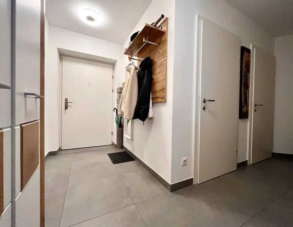 Bergheim: Moderne 3-Zimmer-Gartenwohnung mit überdachter Terrasse