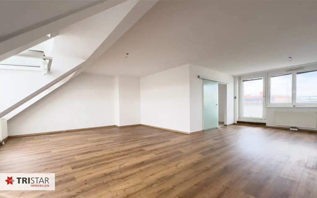 4-Zimmer-Dachtraum mit Südwest-Terrasse & Weitblick & Garage