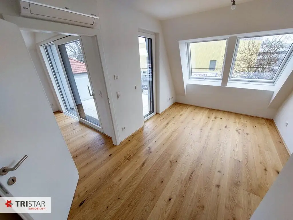 Moderne Dachgeschoßwohnung in 1220 Wien - Erstbezug mit Terrasse und Fußbodenheizung!