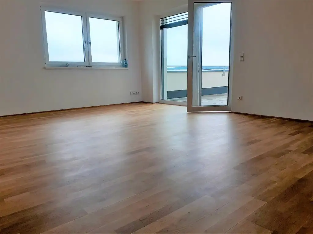 Beeindruckende 3 Zimmerwohnung mit großer Dachterrasse, Carportplatz und Stellplatz