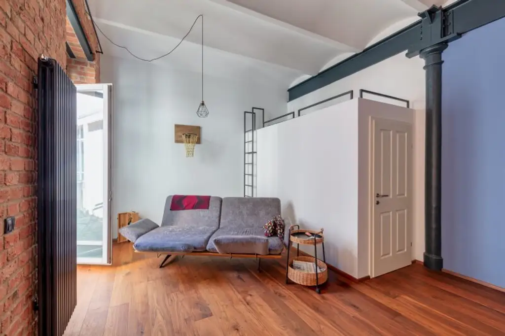 Stilvolle Loft-Wohnung mit Westbalkon & Premiumausstattung in historischem Fabriksgebäude