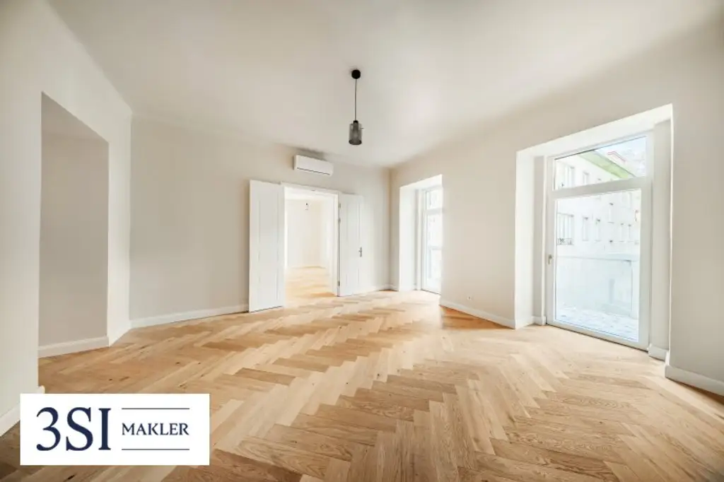 Wohnen beim Schloss Belvedere: Erstbezug im Stilaltbau mit 2 Balkonen und Klimaanlage!