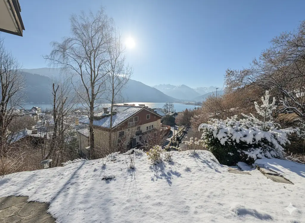 Traumhafte Gartenwohnung in Zell am See mit herrlichem Seeblick, Ski in Ski out!