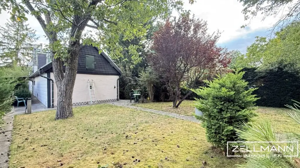 Wohnen mit Potenzial: Sanierungsbedürftiges Einfamilienhaus mit Garten und Nebengebäuden in Liesing | ZELLMANN IMMOBILIEN