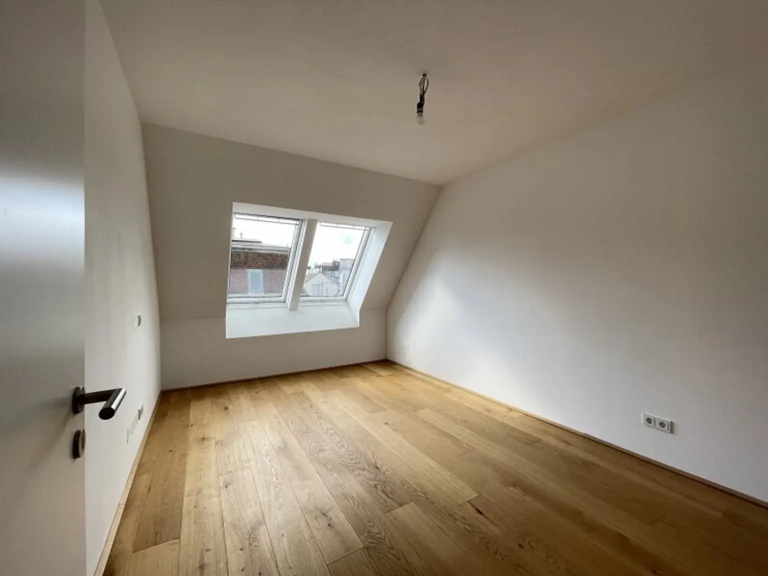 Stilvolle Dachgeschosswohnung mit außergewöhnlicher Dachterrasse in 1090 Wien