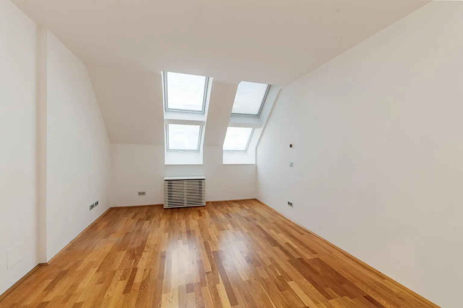 Altbau trifft Moderne – Wohnen über den Dächern