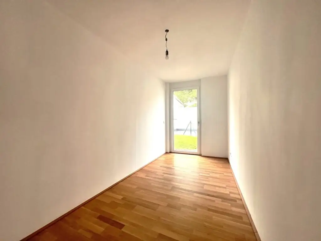 Sehr schöne Familienwohnung mit Terrasse und  großer Gartenfläche (T 1.3 /  EG)