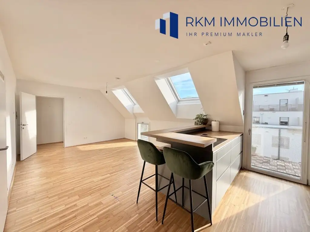 Helle 3-Zimmer-Dachgeschosswohnung mit Balkon in TOP Lage