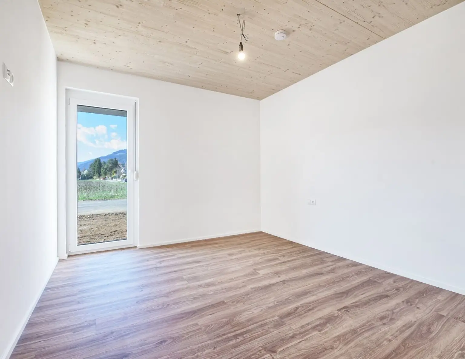 3-Zimmer-Anlegerwohnung mit 345 m² Garten, Terrasse, nachhaltige Bauweise, Landskron - Investition mit Zukunft