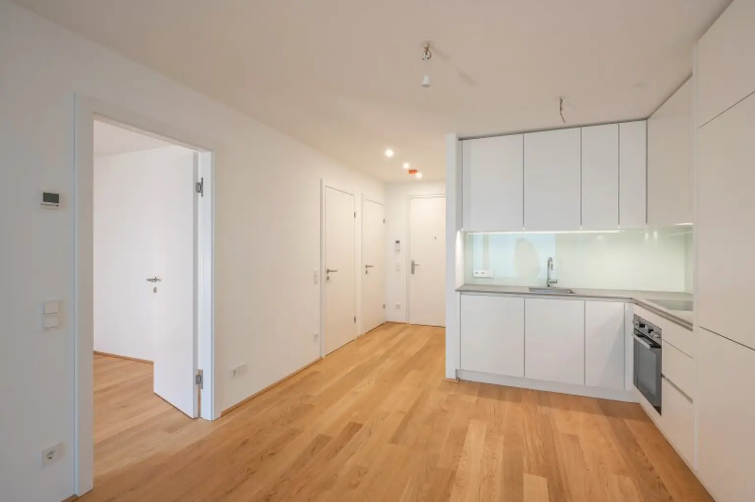 EDUART-Die Kunst des Wohnens: Hochwertiger 2-Zimmer NEUBAU-ZWEITBEZUG mit 15m² Garten und 10m² Terrasse! (8/7)
