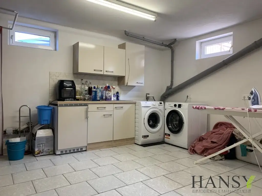 Großzügiges, bezugsfertiges Traumhaus mit Baugrund, Doppelgarage und Gartenidylle