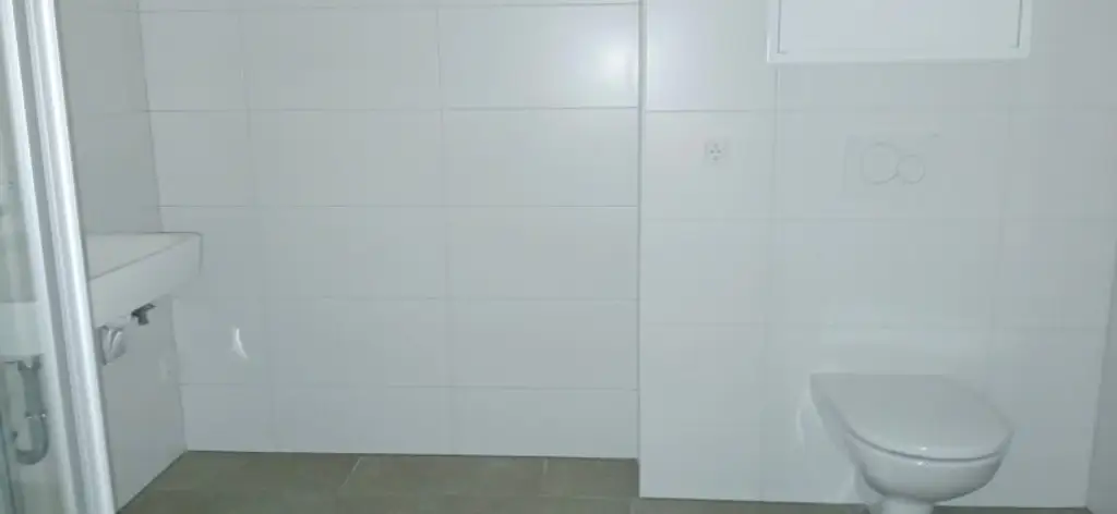 NEUBAU - ERSTBEZUG - Top 18 - Wunderschöne 2 Zimmerwohnung mit großem Balkon und eigenem Tiefgaragenplatz