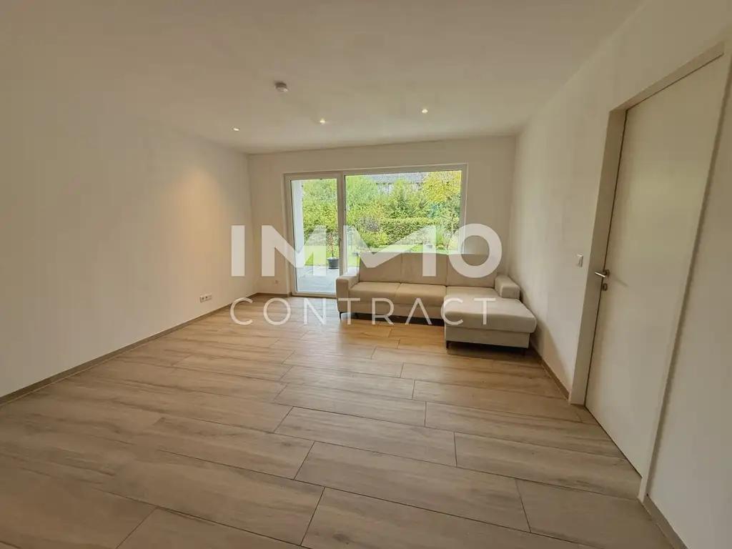 Ideale 2-Zimmer Gartenwohnung mit Tiefgarage und Parkplatz