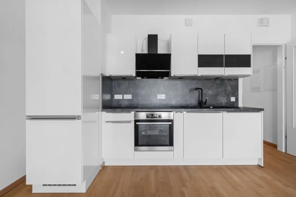 Modernes Wohnen über den Dächern Wiens – stilvolle Neubauwohnung mit Loggia im 18. Stock des Helio Towers