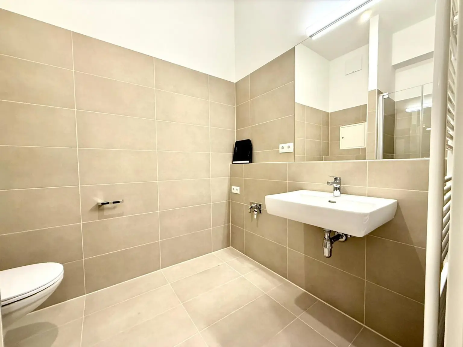 Wunderbare, moderne 1-Zimmer-Wohnung mit Loggia – 
Erstbezug in guter Lage des 12. Bezirks!