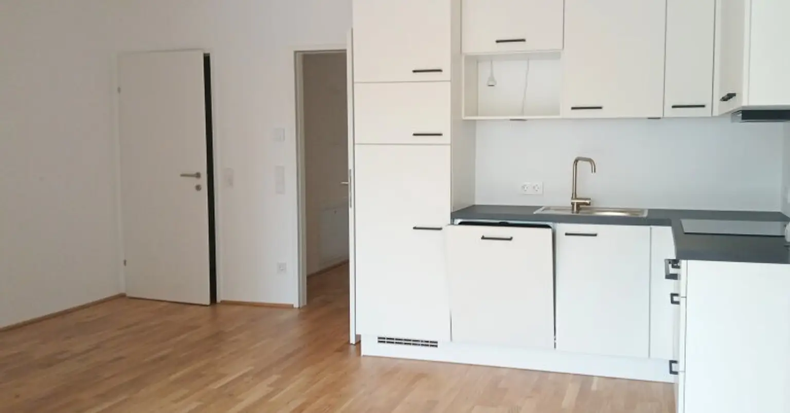 NEUBAU - ERSTBEZUG - Top 18 - Wunderschöne 2 Zimmerwohnung mit großem Balkon und eigenem Tiefgaragenplatz